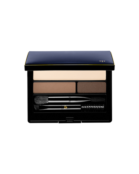 Photo of "EYEBROW AND EYELINER COMPACT". The compact contains three shades of powder, along with a brush, a spoolie brush, and an applicator tip. The lid is blue-black with a gold-engraved brand logo. Shade: 1-RD-BR.