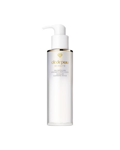 Photo of a translucent white pump bottle of "MICELLAR CLEANSING WATER" with elegant gold accents. SIZE: 200ML