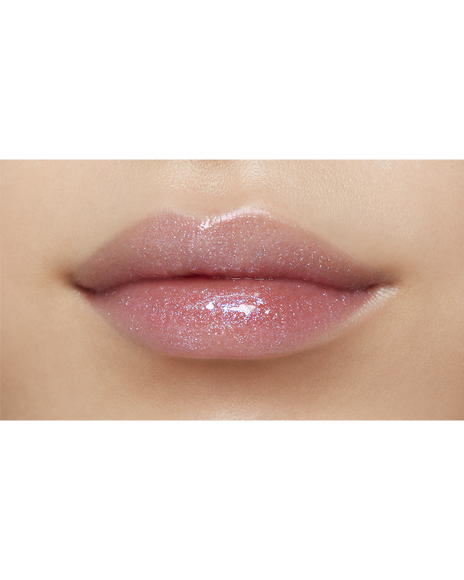 Photo of lips of a model with a medium skin tone wearing "CREAM ROUGE SPARKLES" in shade 301.