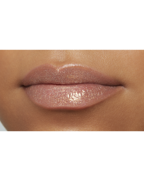 Photo of lips of a model with a deep skin tone wearing "CREAM ROUGE SPARKLES" in shade 302.