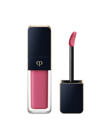 Photo of "CREAM ROUGE SHINE", with a blue-black cap engraved with the brand logo and a clear body. The cap comes with a stick with a tip attached. SHADE: 206.