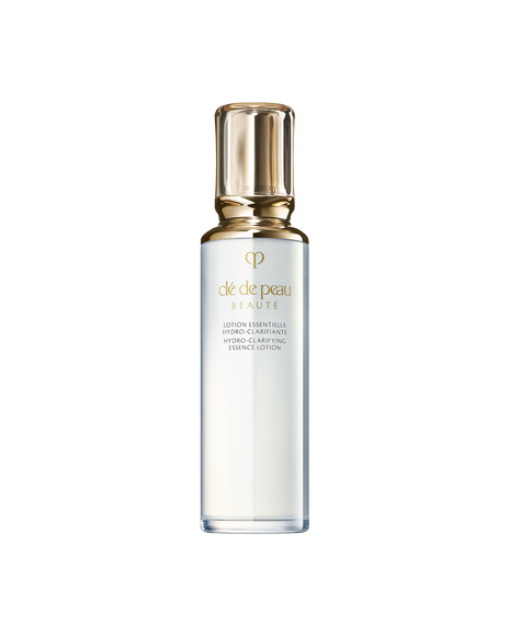 Photo of HYDRO-CLARIFYING ESSENCE LOTION in a clear glass bottle with a rounded, translucent gold cap.SIZE: 170mL.