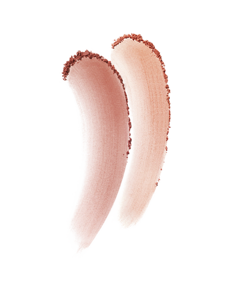 Photo of a soft color payoff with fine powder particles spreading, creating a gentle texture. Shade: 105