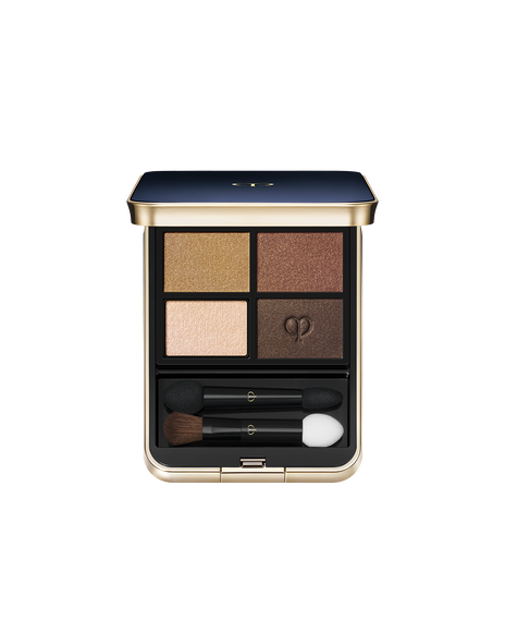 Photo of "EYE COLOR QUAD (REFILL)" set in a square case with a blue-black top and gold brand logo. Includes tip and brush. Shade: 4-Ocean Sunrise.