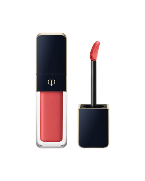 Photo of "CREAM ROUGE SHINE", with a blue-black cap engraved with the brand logo and a clear body. The cap comes with a stick with a tip attached. SHADE: 202.