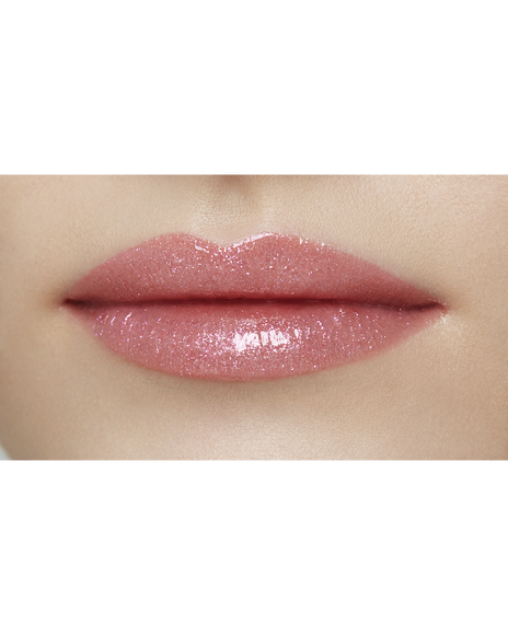 Photo of lips of a model with a light skin tone wearing "CREAM ROUGE SPARKLES" in shade 304.