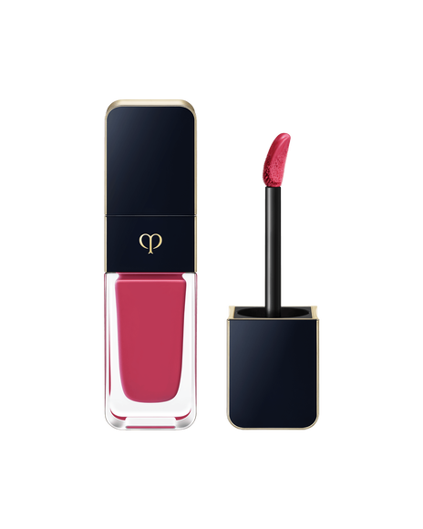 Photo of CREAM ROUGE SHINE, with a blue-black cap engraved with the brand logo and a clear body. The cap comes with a stick with a tip attached. SHADE: 203.