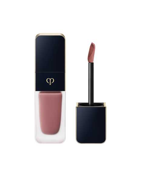 Photo of CREAM ROUGE MATTE with a translucent body and a blue-black cap engraved with the brand logo. The cap comes with a stick with a tip attached. SHADE: 111.