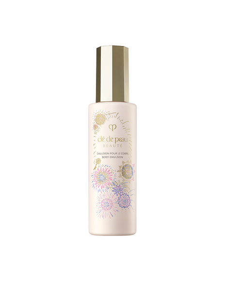 Photo of the 26 SS Gift Collection limited-edition BODY EMULSION. The light pink bottle features the Radiance Fireworks design with illustrations of flowers blooming like fireworks and a key motif. 