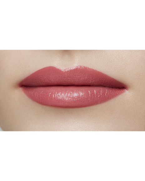 Photo of a light skin tone model  wearing "LIPSTICK MATTE" in Agent Of Change on the lips.