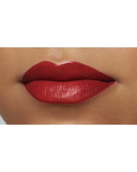 Photo of a deep skin tone model  wearing "LIPSTICK MATTE" in High Achieve on the lips.