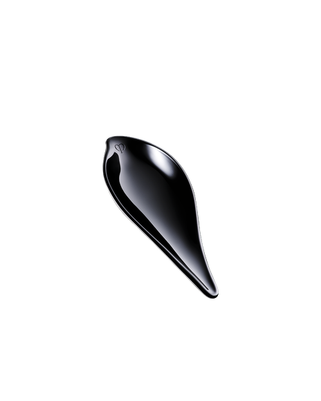 Photo of a spatula with a sleek, glossy black color.