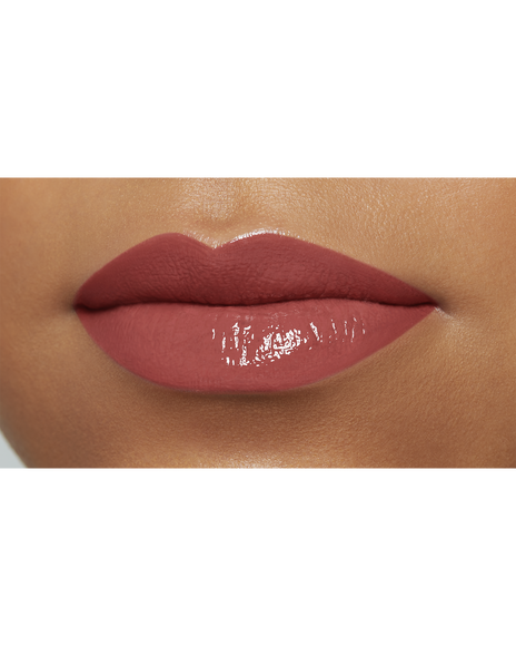 Photo of a deep skin tone model  wearing "CREAM ROUGE SHINE" in shade 204 on the lips.