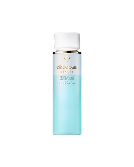 Photo of a pale blue bottle of "EYE AND LIP MAKEUP REMOVER M" with a white cap and the gold brand logo and product name.