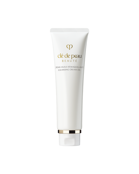 Photo of a white tube of &ldquo;CLEANSING CREAM OIL.&rdquo; Gold brand logo and product name are printed on the front. The cap features gold detailing.