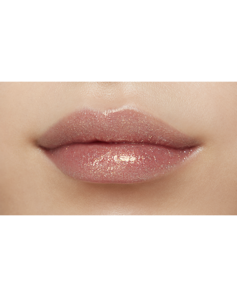 Photo of lips of a model with a medium skin tone wearing "CREAM ROUGE SPARKLES" in shade 302.