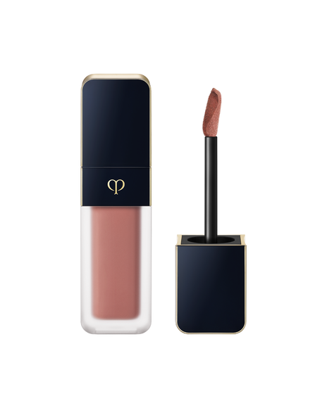 Photo of "CREAM ROUGE MATTE", with a translucent body and a blue-black cap engraved with the brand logo. The cap comes with a stick with a tip attached. SHADE: 111.