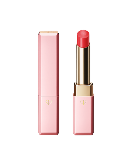 Photo of "LIP GLORIFIER" with a refined gold tube, wrapped in a bright pink cap and case. Shade: Red.