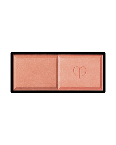 Photo of the rectangular "POWDER BLUSH DUO (Refill)" featuring two powders side by side. The left side has a matte texture, and the right side is a delicate pearly powder embossed with a logo in the center. Shade: 103.