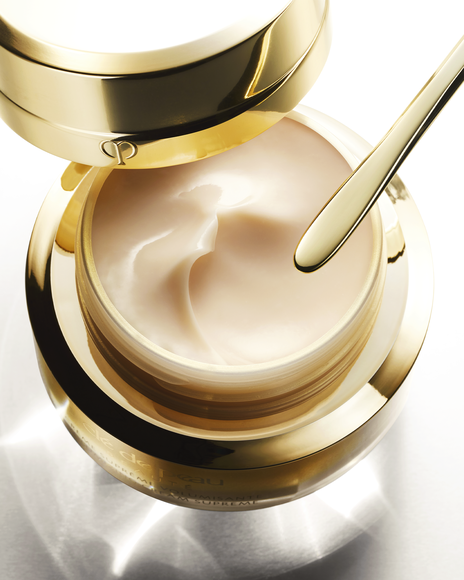 Photo of a spatula scooping out the rich, smooth cream inside.