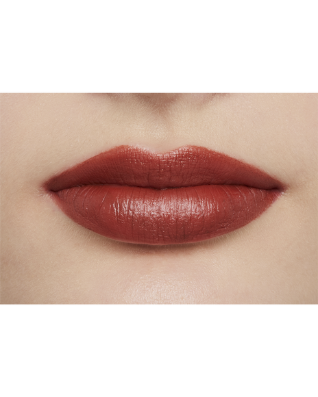 Photo of a light skin tone model  wearing "LIPSTICK MATTE" in High Achieve on the lips.