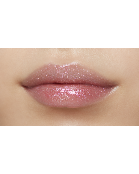 Photo of lips of a model with a medium skin tone wearing "CREAM ROUGE SPARKLES" in shade 303.