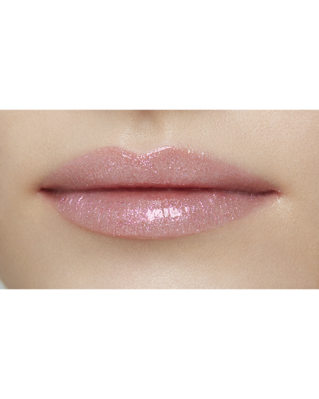 Photo of lips of a model with a light skin tone wearing "CREAM ROUGE SPARKLES" in shade 303.