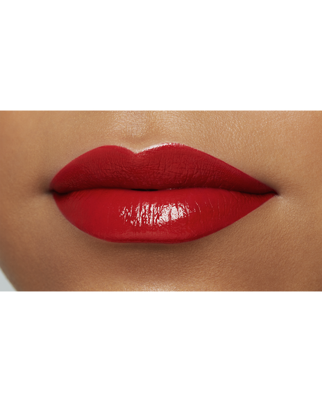 Photo of the lips of a model with a deep skin tone wearing "LIPSTICK" in the shade Legend of Rouge.