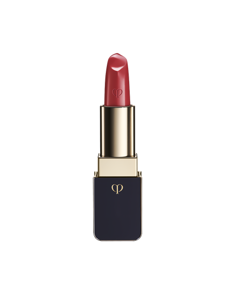 Photo of "LIPSTICK" with the stick twisted up. The tip is engraved with the brand logo, and the body features a combination of blue-black and gold sides. SHADE: Whispering Rosewood.