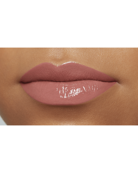 Photo of a deep skin tone model wearing CREAM ROUGE SHINE in shade 201 on the lips.