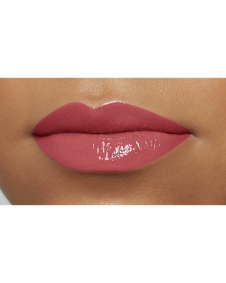 Photo of a deep skin tone model  wearing "CREAM ROUGE SHINE" in shade 203 on the lips.