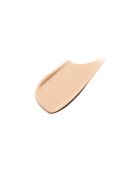 Photo of a creamy, smooth, and glossy texture. Shade: Ivory.