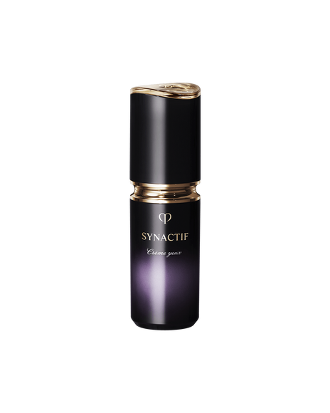 Photo of a black cylindrical SYNACTIF EYE CREAM  adorned with a shiny gold ring and gold lettering.