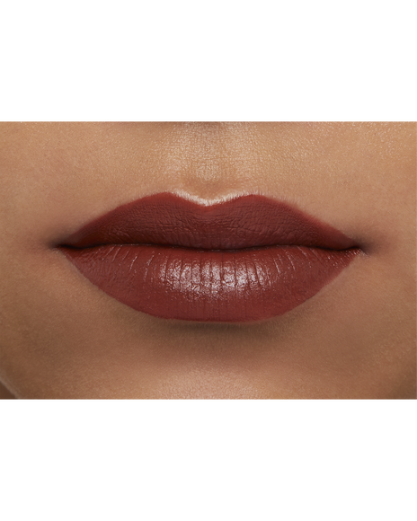 Photo of a deep skin tone model  wearing "LIPSTICK MATTE" in High Achieve on the lips.