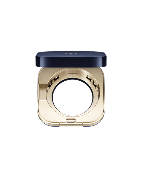 Photo of an exclusive case for "RADIANT CUSHION FOUNDATION NATURAL (REFILL)" with the lid open, showing an interior space designed to hold a refill.