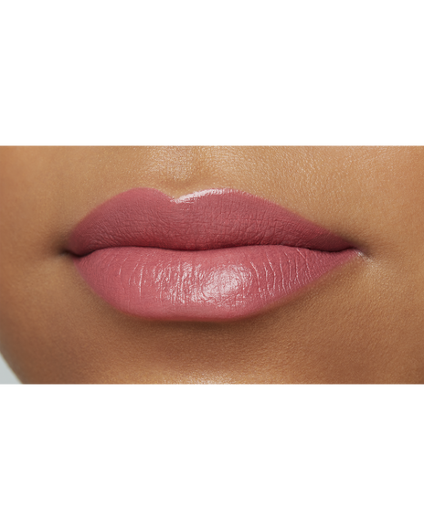 Photo of a deep skin tone model  wearing "LIPSTICK MATTE" in Agent Of Change on the lips.