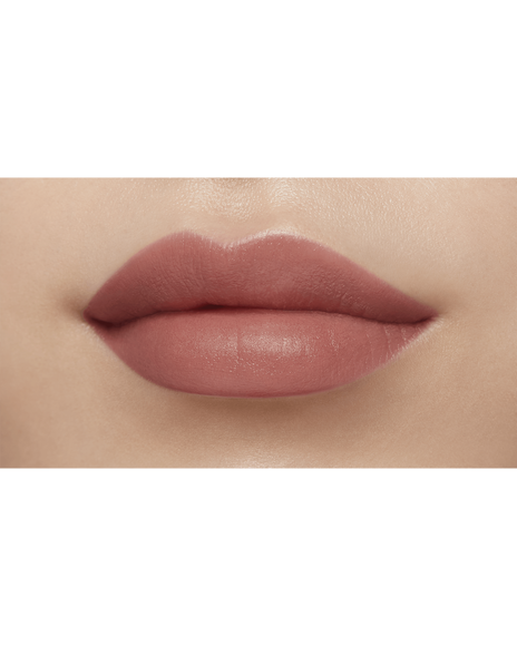 Photo of a medium skin tone model wearing CREAM ROUGE MATTE in shade 111 on the lips.
