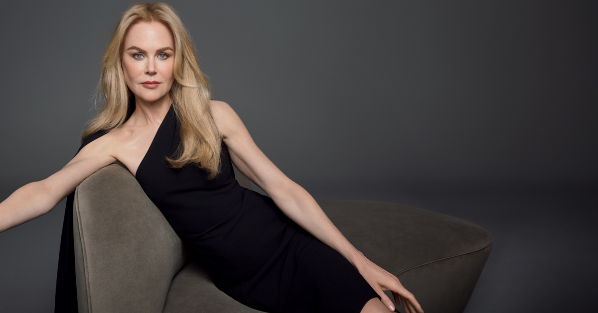 Photo of Nicole Kidman in a black dress, reclining on a sofa with radiant skin, alongside Cl&eacute; de Peau Beaut&eacute;'s night cream, La Cr&egrave;me, and foundation, The Foundation. 