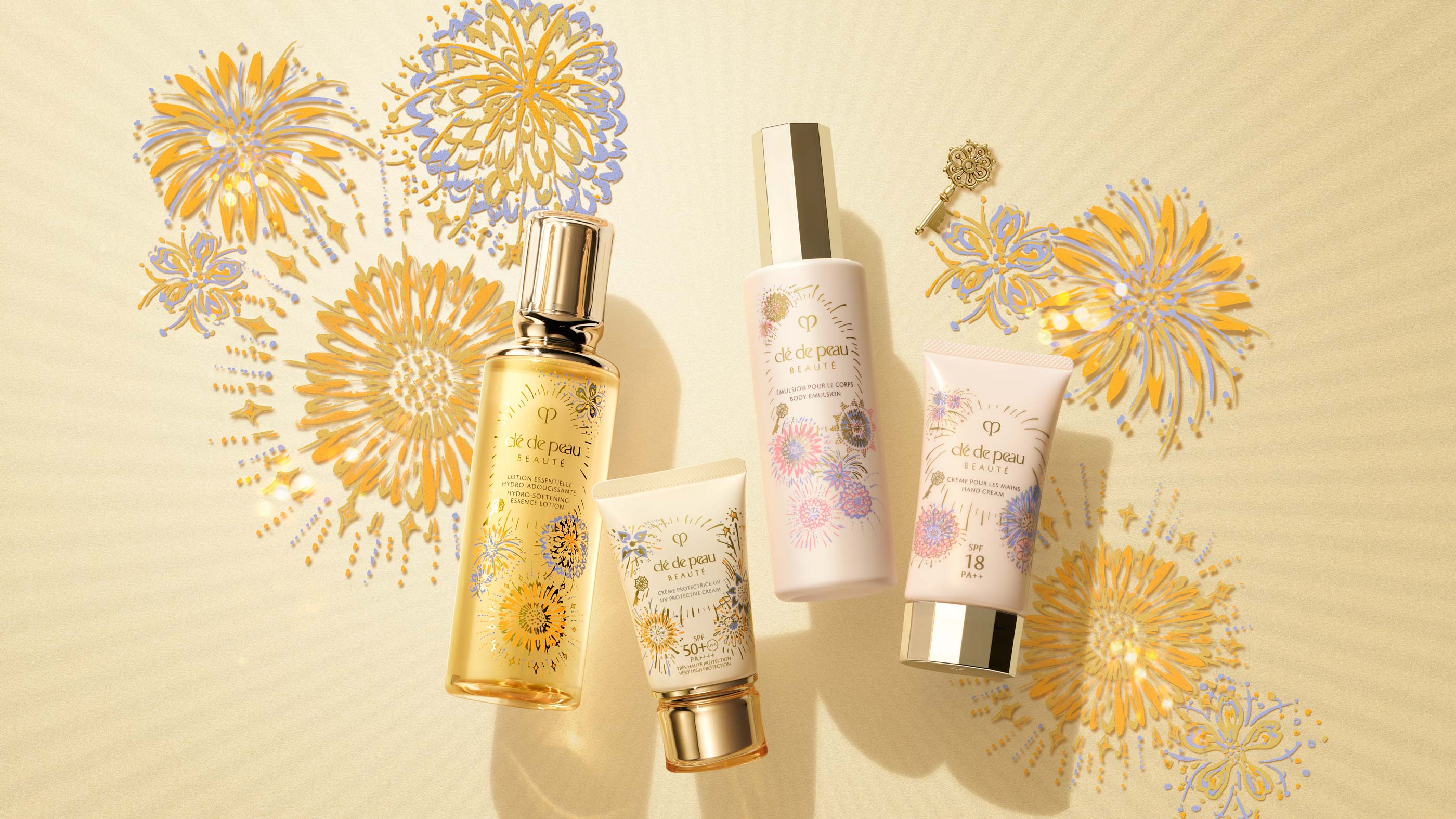 Photo of 4 products from 26SS limited-edition &ldquo;Spark Excitement&rdquo; collection. The background design features golden and lavender flowers bursting like fireworks, with an ornate key symbolizing the key to happiness.