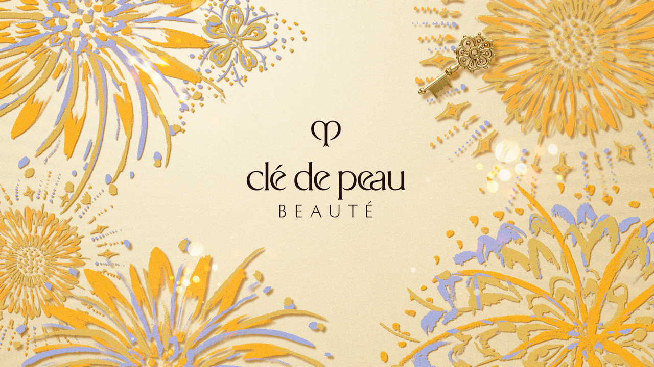 Photo of red wallpaper with gold decorative patterns forming a circular frame around the brand logo at the center, inspired by Chinese New Year and horse motifs.