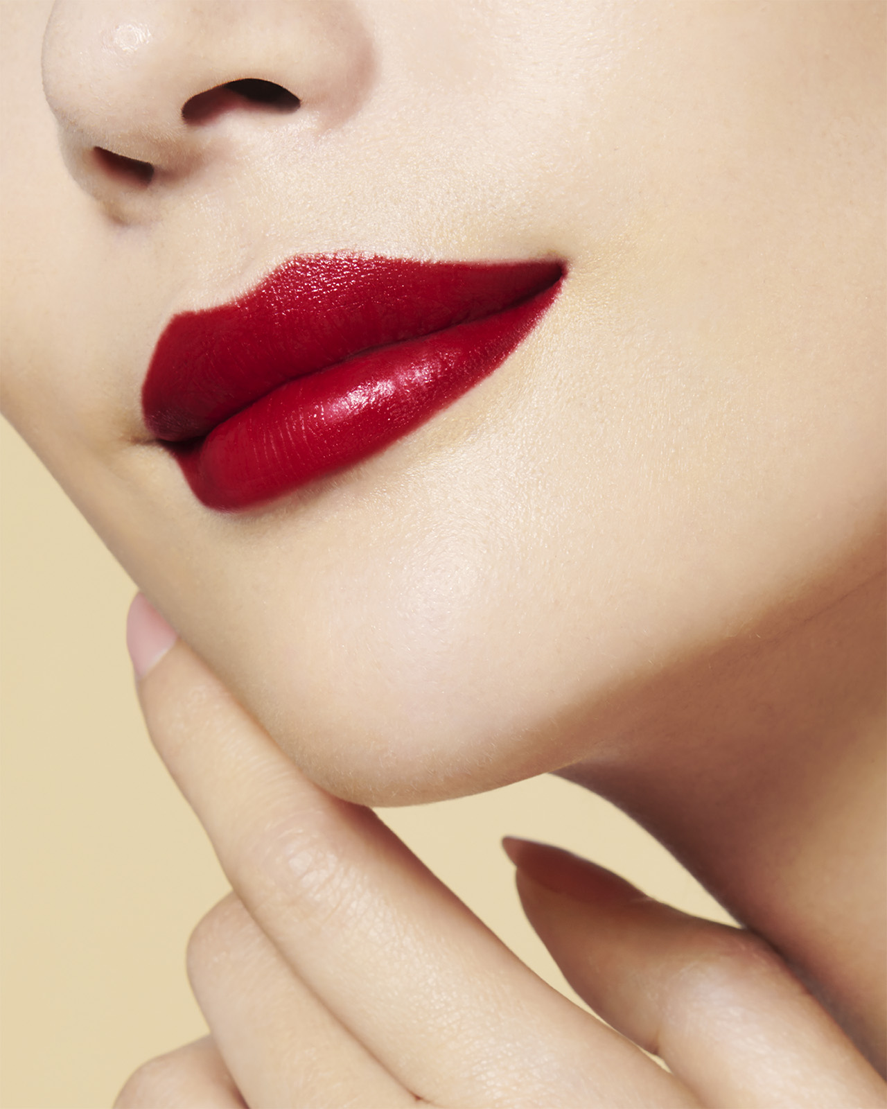 Photo of a light skin tone model  wearing "THE PRECIOUS LIPSTICK" on the lips.