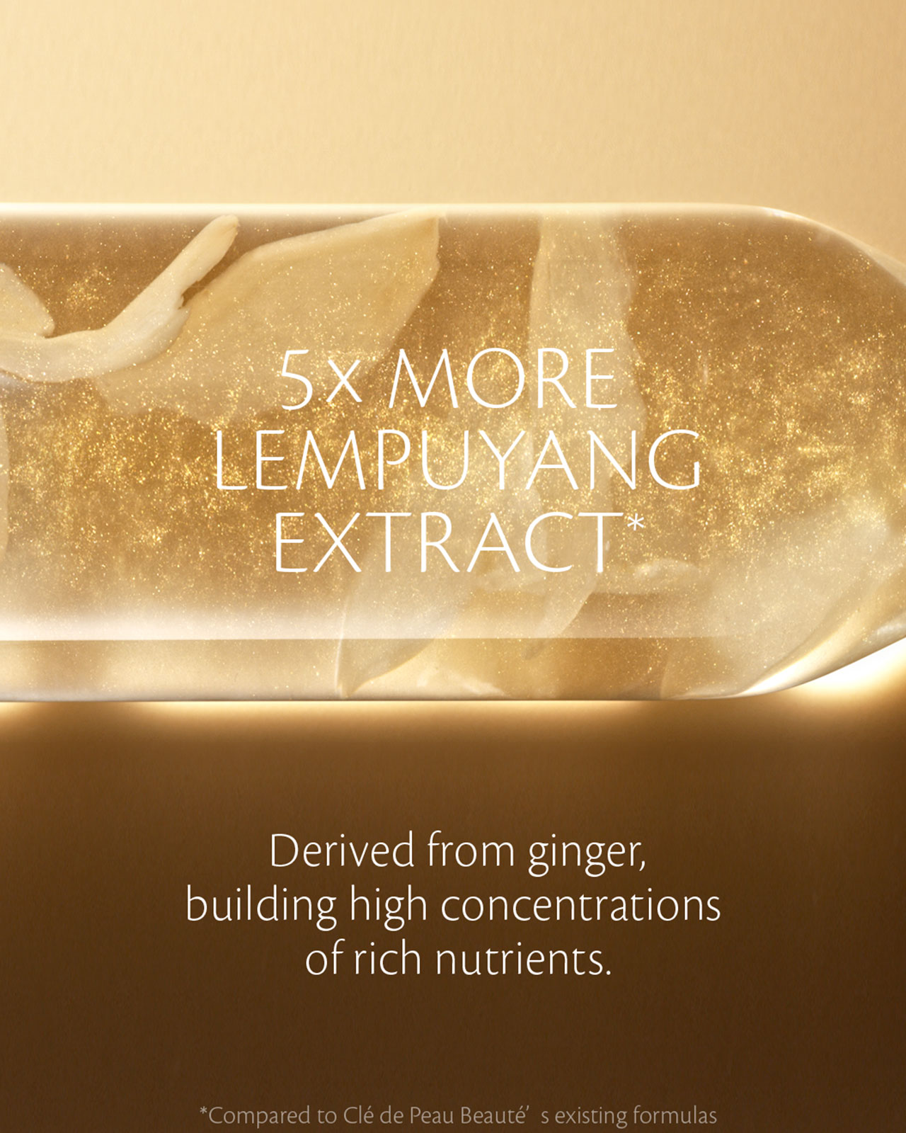 Photo of a gold-colored capsule with shimmering particles, featuring the texts: &ldquo;5x MORE LEMPUYANG EXTRACT&rdquo; and &ldquo;Derived from ginger, building high concentrations of rich nutrients.&rdquo;